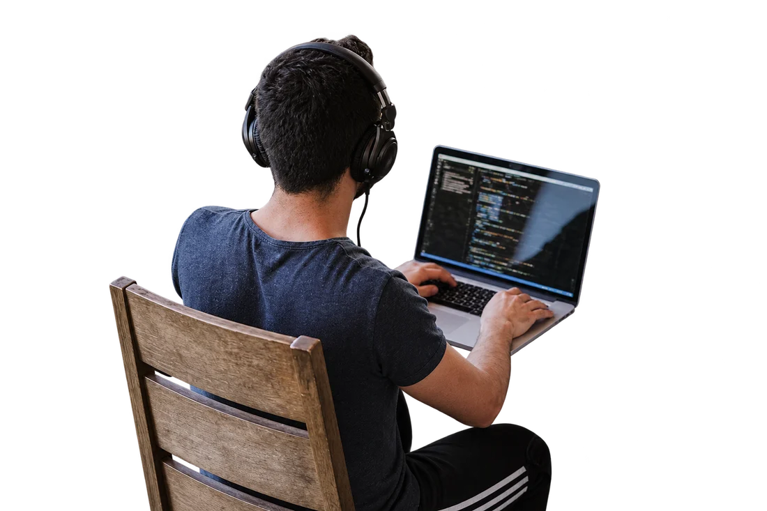 Creative workspace collage: a stock-photo subject and laptop extend beyond a blue frame